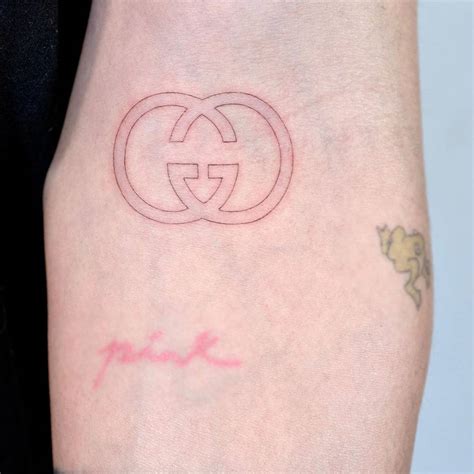 house of Gucci tattoos